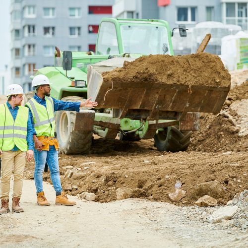 building-inspectors-watching-excavation-process-XHADK9Q